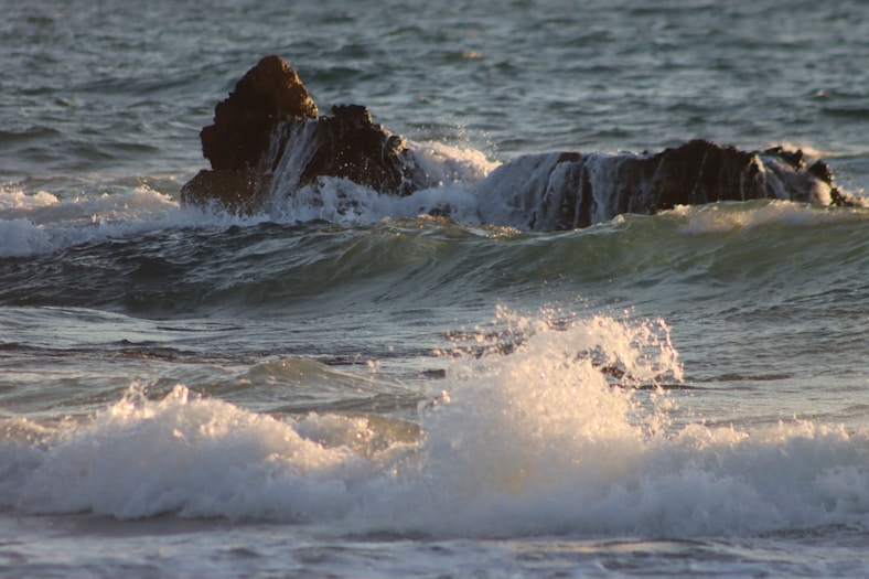 Waves breaking along a rocky coastline