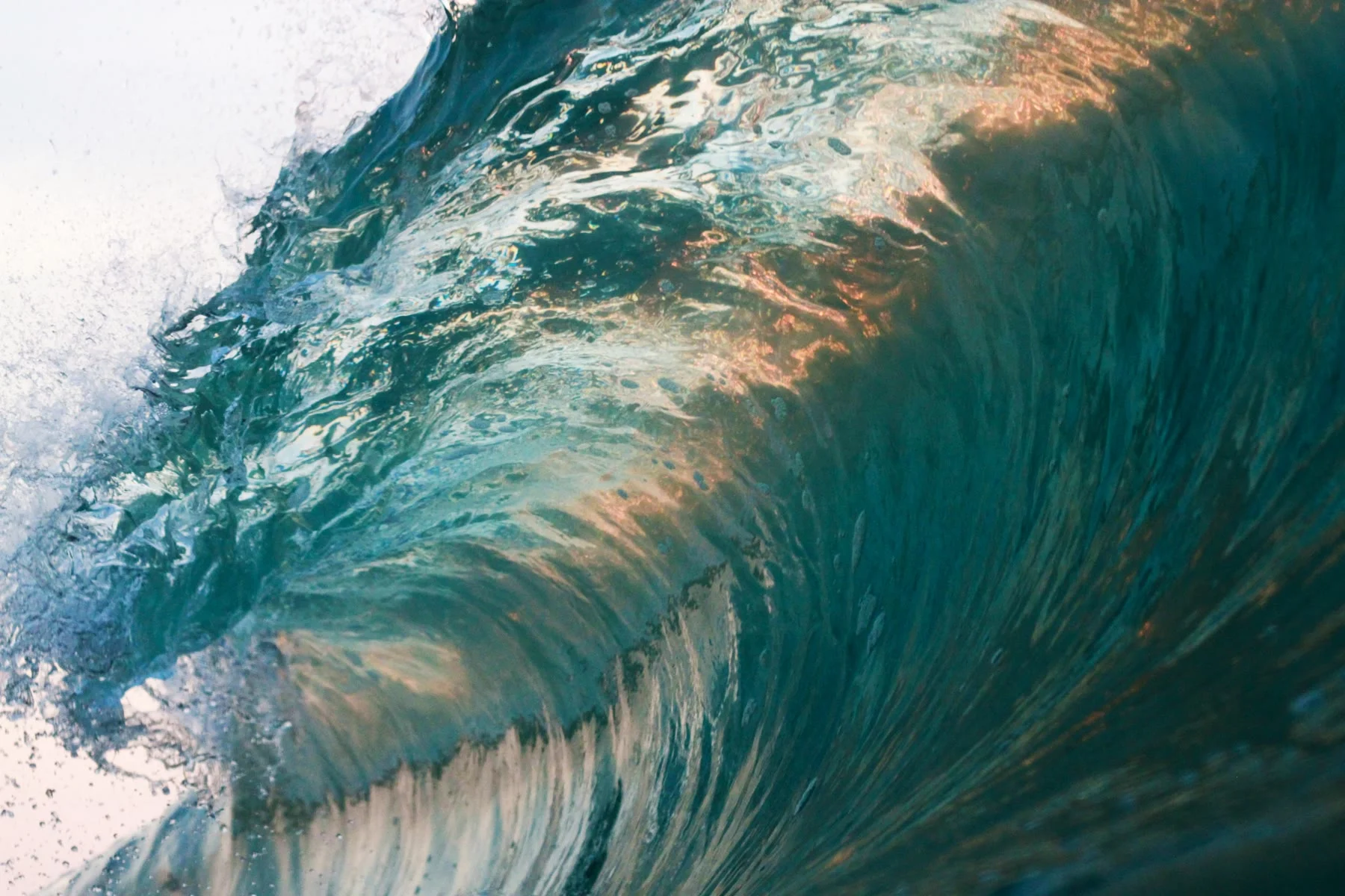 Breaking ocean wave seen from above