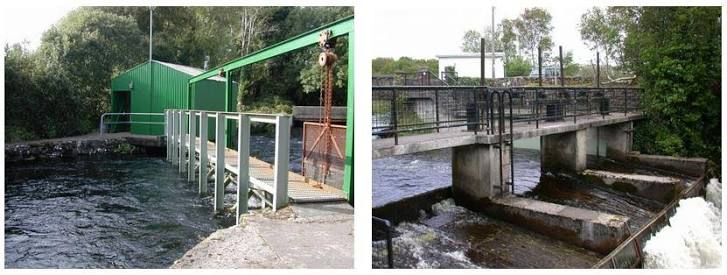 Fish trap structures and walkways spanning flowing river channels.